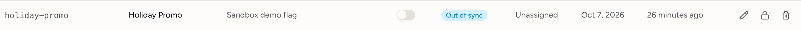 A flag row with the blue Out of sync badge in its Status column